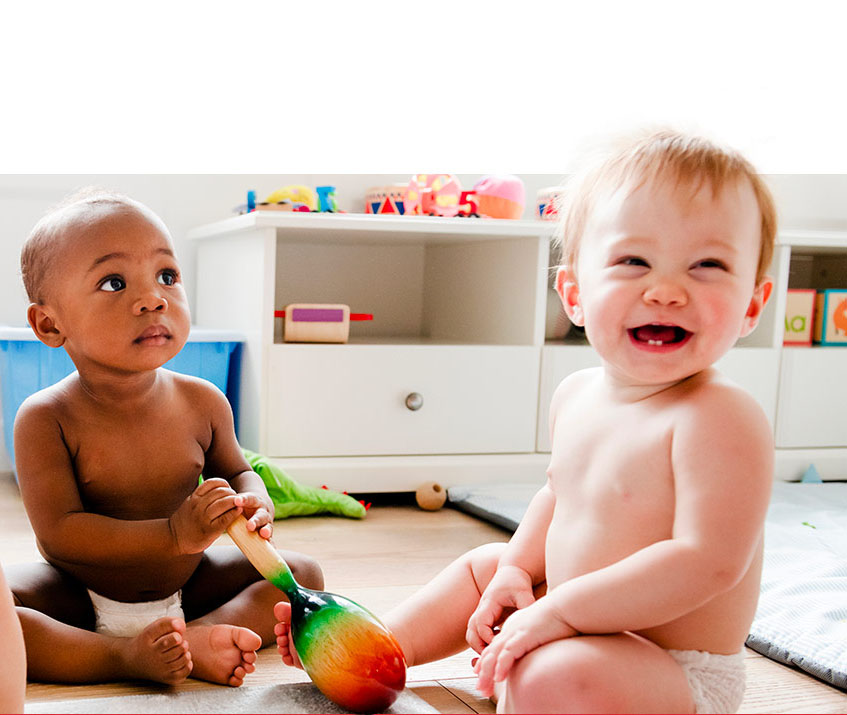 Two babies playing together